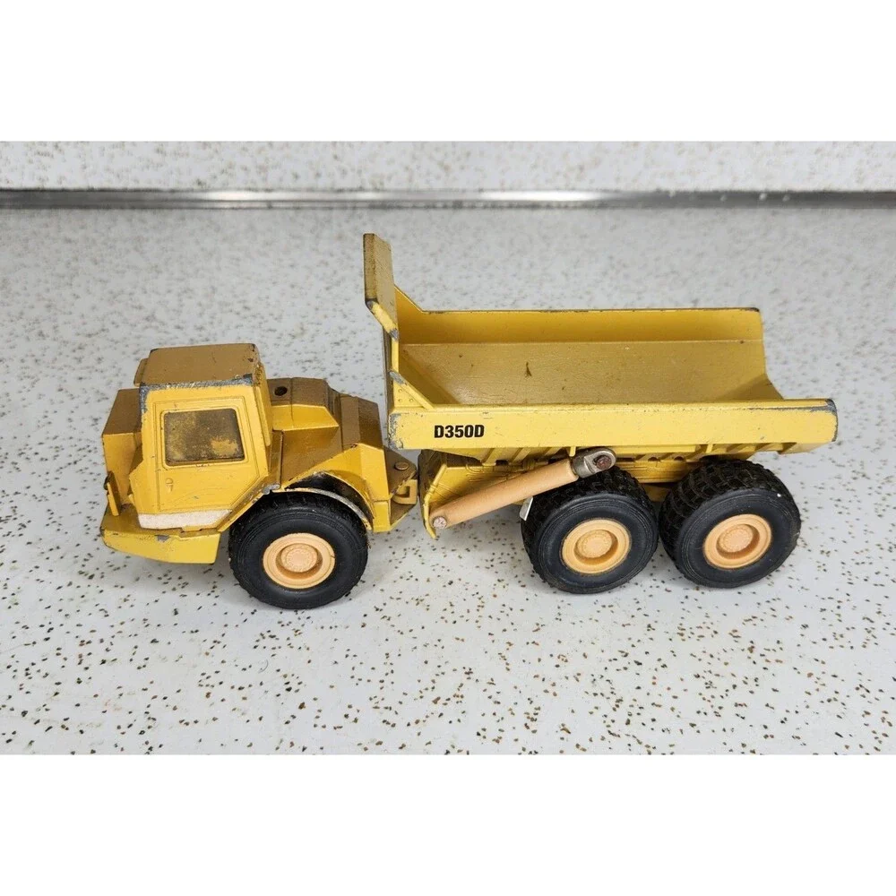 Ertl Mighty Movers 2431 1:50 Caterpillar D350D Articulated Dump Truck Die-Cast
